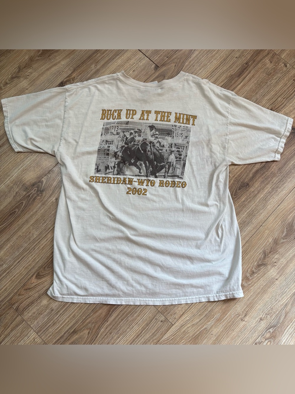 Vintage 2002 Sheridan-Wyo Rodeo "Buck Up At The Mint" Graphic T-Shirt XL flaw